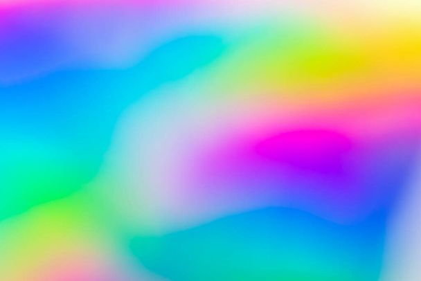 Abstract blur holographic rainbow foil iridescent background - Photo, Image