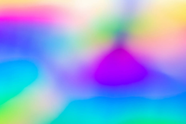 Abstrait flou holographique feuille d'arc-en-ciel fond irisé - Photo, image