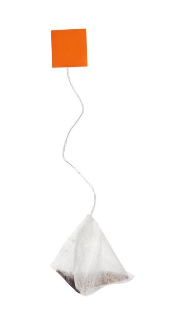 Paper tea bag with tag isolated on white - Fotografie, Obrázek