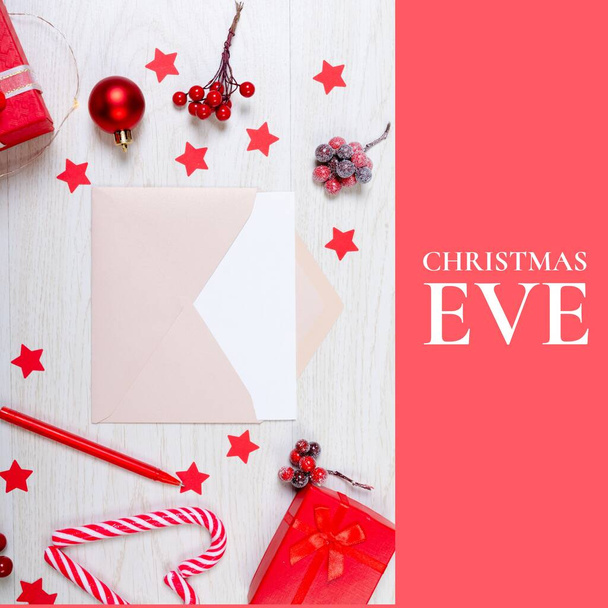 Composition of christmas eve text over christmas decoration. Christmas, festivity, celebration and tradition concept digitally generated image. - Foto, afbeelding