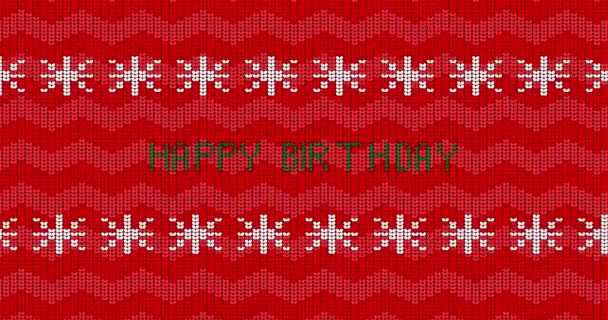 Karácsonyi és újévi ünnepek szezon piros csúnya pulóver fehér hópelyhek és boldog születésnapot szöveg. Animáció a téli kötött pulóver minta. - Felvétel, videó