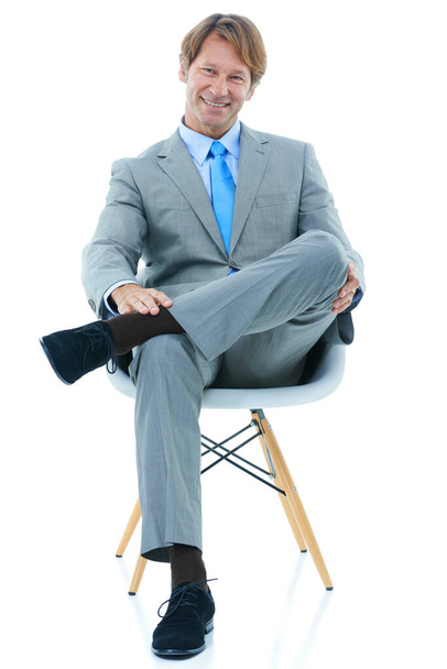Back to business. Studio shot of a businessman isolated on white - Φωτογραφία, εικόνα