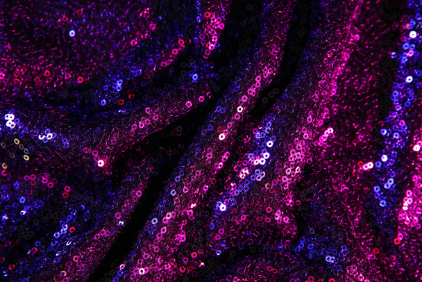 Tessuto viola con paillettes come sfondo - Foto, immagini