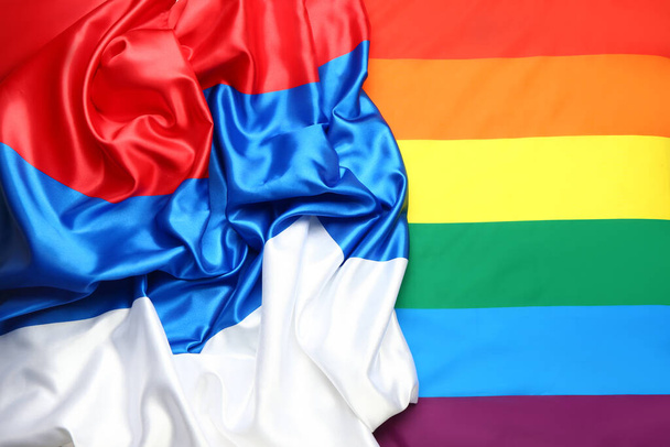Zászló LMBT és Oroszország háttérként, közelkép - Fotó, kép