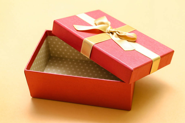 Empty Christmas gift box on beige background - Photo, Image