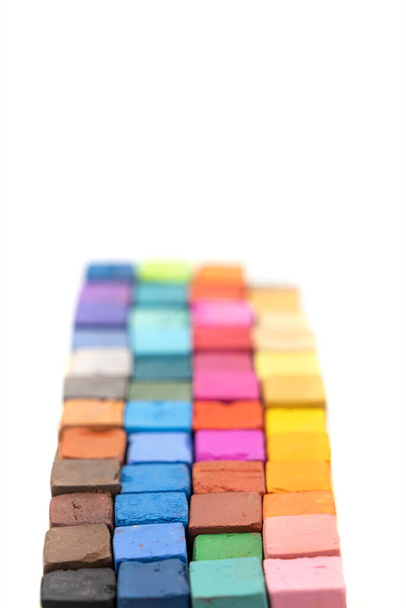 Square colorful pastel chalks closeup, low level angle - Photo, Image