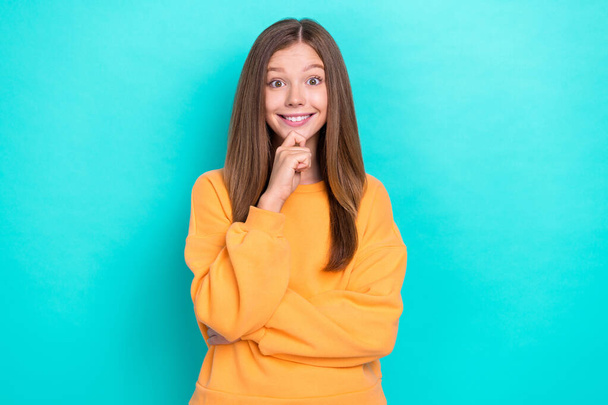 Photo of young cute cheerful toothy beaming smile lady teen age touch chin genius idea solution homework isolated on aquamarine color background. - Foto, Imagem