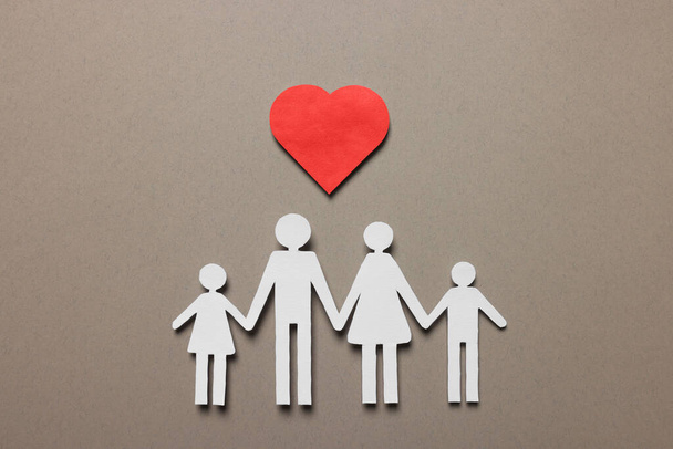 Paper family figures and red heart on light grey background, flat lay. Insurance concept - Фото, зображення