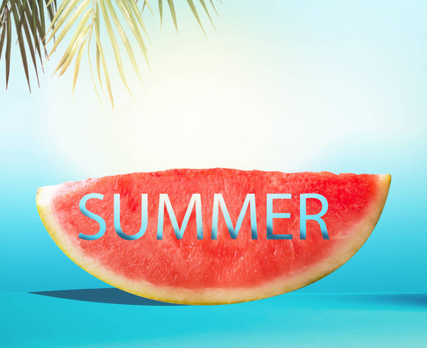 Watermelon slice with text Summer on blue background with palm leaves. Juicy refreshing summer food. Copy space. Summertime concept - Foto, Bild