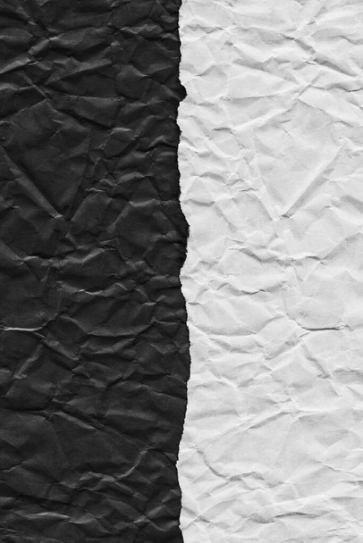 torn edge of dark and light paper. vertical edge crossing. texture - Foto, Imagen