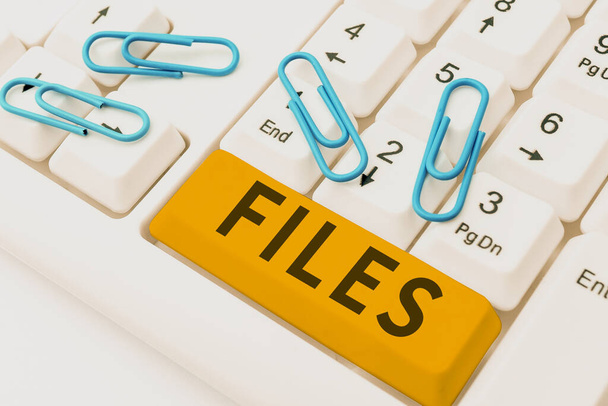 Концептуальный дисплей Файлы, папка бизнес-идеи для хранения свободных документов вместе в порядке простая ссылка - Фото, изображение