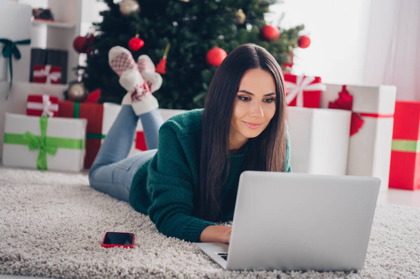 Photo of concentrated focused lady choose presents write sms message email greetings enjoy weekend magic day season house indoors. - Foto, immagini