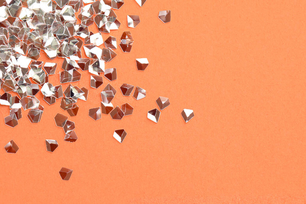 Pile of shiny glitter on pale pink background, flat lay. Space for text - Fotografie, Obrázek