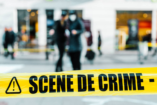 yellow tape to mark off a crime scene in the street - Foto, Imagem