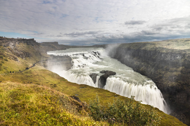 Gullfoss or Golden Falls is one of Iceland most iconic and popular waterfalls, found in the Hvita river canyon in Southwest Iceland. Part of Golden Circle circuit - Zdjęcie, obraz
