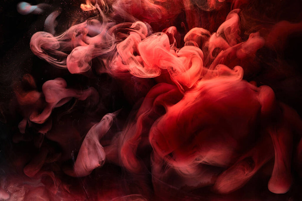 Red black ink abstract background. Acrylic paint backdrop for perfume, hookah, cosmetics. Mysterious smoke clouds, colorful fog - Foto, Imagem