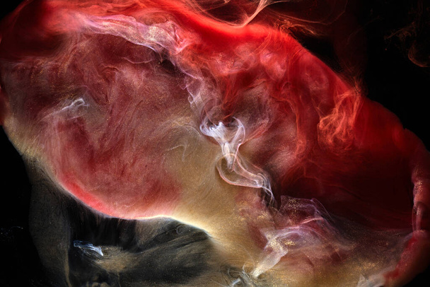 Contrasting red ink abstract background. Multi-colored acrylic paints backdrop for perfume, hookah, cosmetics. Mysterious smoke clouds, colorful fog - Photo, Image