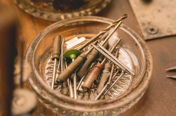 Instruments kit in a large workshop for the manufacture of handmade jewelry. - 写真・画像