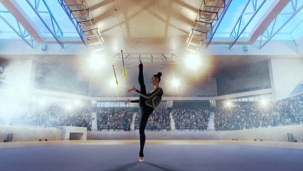 Rhythmic gymnast in professional arena - Photo, Image