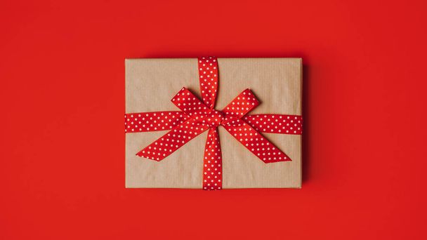 Subscription Boxes to Give and Receive. Subscription Gift Box, Care package with red ribbon on red background - Foto, Imagem