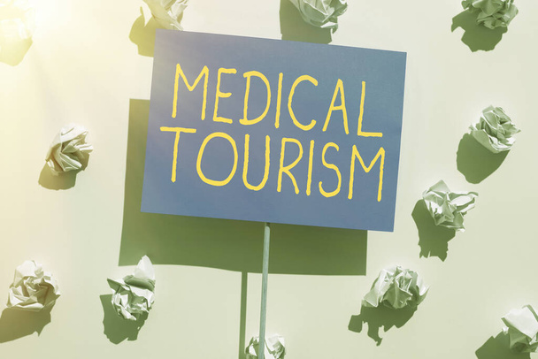 Text caption presenting Medical Tourism, Conceptual photo traveling outside the country to receive medical care - Photo, Image
