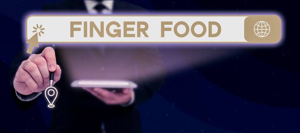 Signo de texto que muestra Finger Food, Word Escrito en productos y digestivos que debe sostenerse con los dedos para comer - Foto, imagen