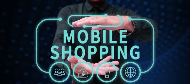 Teksti merkki osoittaa Mobile Shopping, Käsite tarkoittaa tavaroiden ja palvelujen kauppaa langattomien laitteiden - Valokuva, kuva