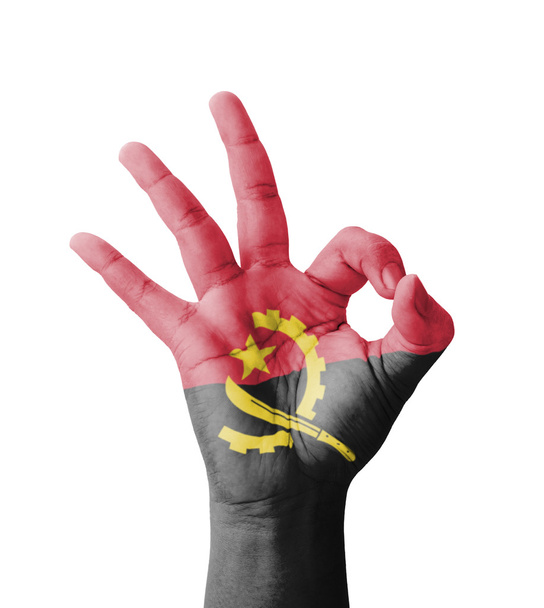 Mão fazendo Ok sinal, bandeira de Angola pintado como símbolo de melhor quali
 - Foto, Imagem