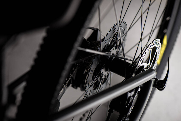 Closeup rear cassette on the moutain bike in low light. - Foto, Bild