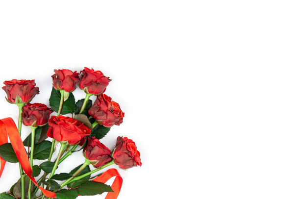 Bouquet of red roses on a white background isolated, flat lay, copy space. - Fotoğraf, Görsel