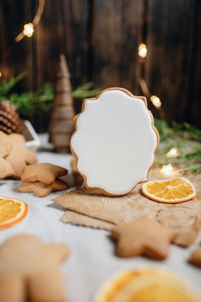 Christmas gingerbread with white icing mockup for painting, homemade baking - 写真・画像
