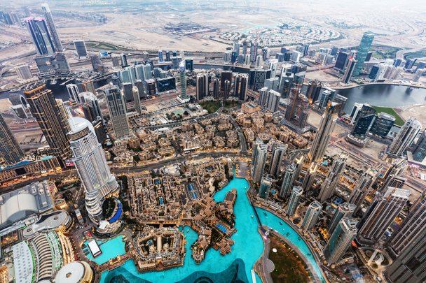 Dubai UAE aerial rooftop view from Burj Khalifa. Famous fountain and downtown - Photo, Image