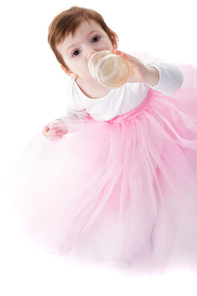 Girl is drinking from bottle isolated - Photo, Image