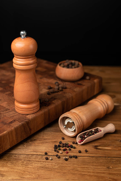 Wood pepper mill. Wooden grinder for salt or pepper. - Photo, image