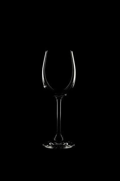 Empty wine glass on black background - Foto, Imagem