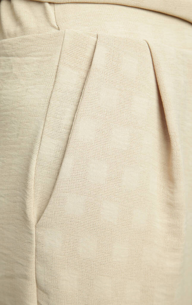 Close up imagem de bolso lateral de calças de linho bege - Foto, Imagem