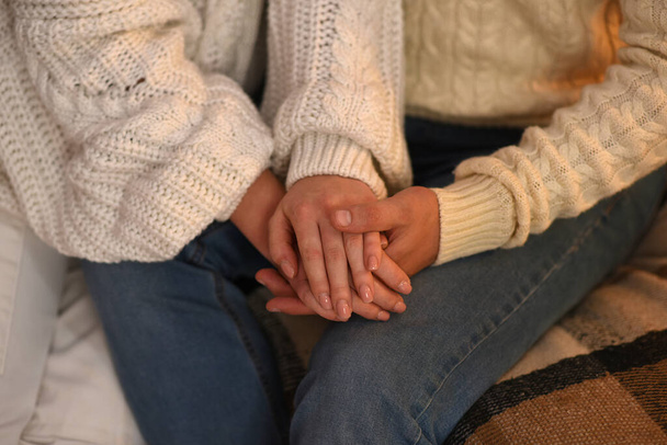 Husband holding his wife's hand - Photo, image