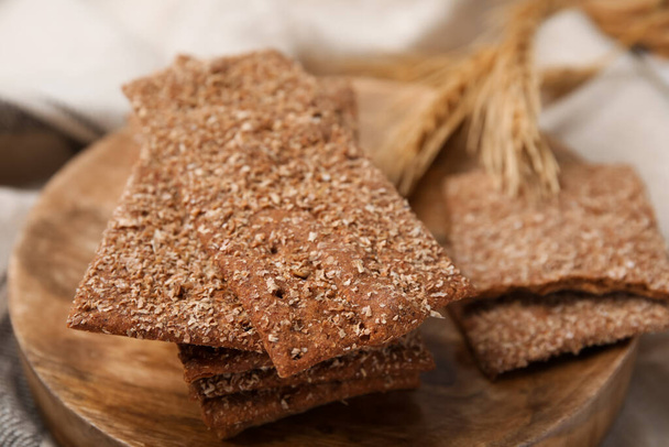 Stack of dry rye crispbreads on table, closeup - Photo, image