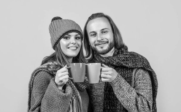 Happy couple of man and woman hold tea cups yellow background, morning. - Fotoğraf, Görsel