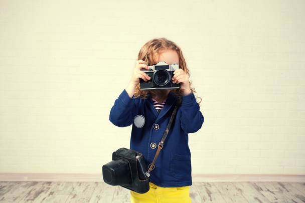 Little girl photographing - Фото, изображение