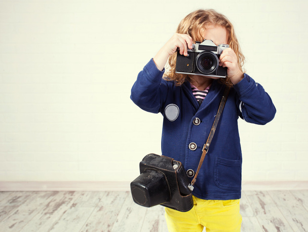 Little girl photographing - Фото, изображение