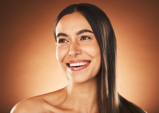 Skincare, beauty and face of woman with smile in studio on brown background for spa, wellness and cosmetics. Makeup, dermatology and happy girl for beauty products, skincare products and body care. - Valokuva, kuva
