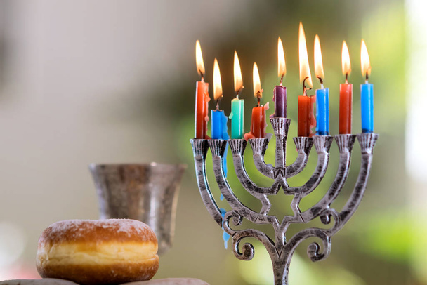 Judaism tradition family religious holiday symbols Judaism hanukkah celebration lighting hanukkiah menorah - Фото, изображение