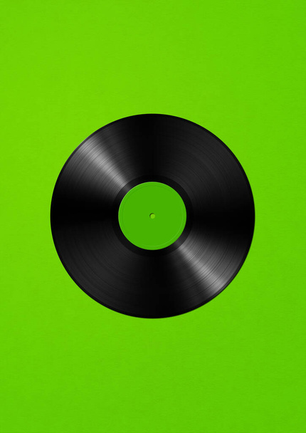 Vinyl record isolated on green background. 3D illustration - Фото, изображение