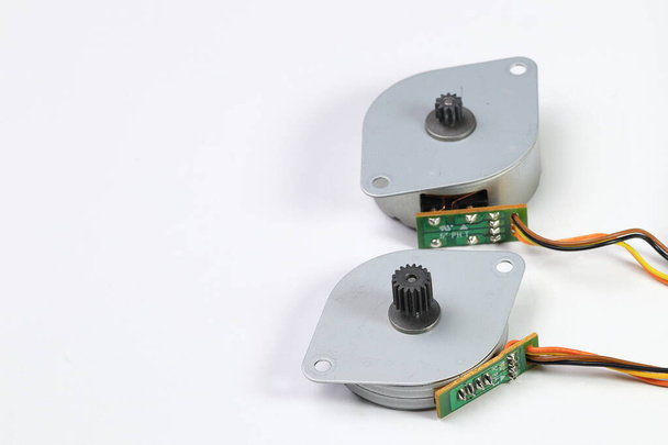 electric DC motors (AC servo motor, DC brush-less motor and stepping motor) which runs on direct electric current along with speed controlling device. - Photo, Image