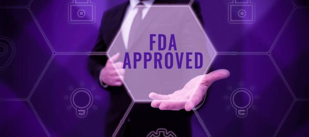 Texto que mostra inspiração Fda Aprovado, Conceito que significa FDA concordou que o produto ou fórmula é seguro e / ou eficaz - Foto, Imagem