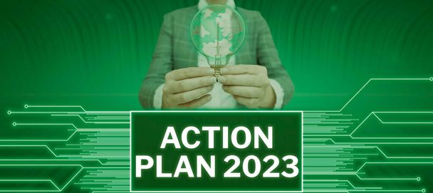Texto que muestra la inspiración Plan de acción 2023, escaparate de negocios para hacer lista contiene el número de cosas que se harán el próximo año - Foto, Imagen