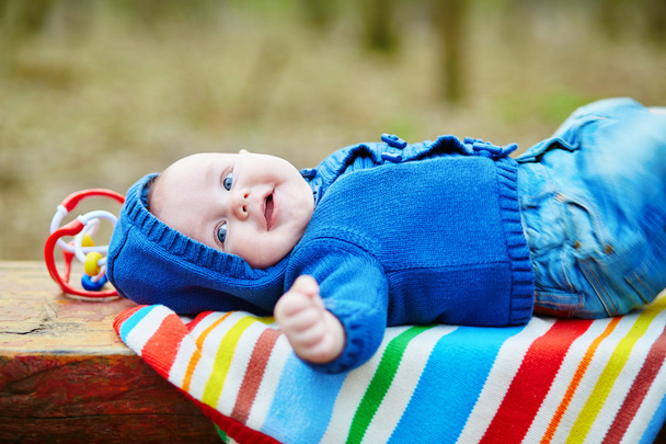 Adorable 4 month baby boy lying on his back - Foto, immagini