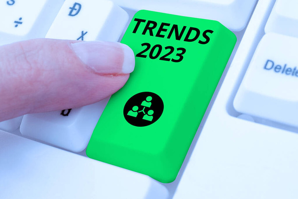 Sign displaying Trends 2023, Business overview Upcoming year prevailing tendency Widely Discussed Online - Photo, Image