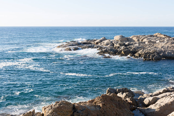 Rocks in the sea, Catalan Costa Brava, Mediterranean Sea - Foto, afbeelding